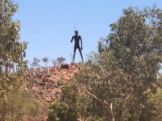 The 17m high sculpture of the Man on the Hill at Aileron Roadhouse.